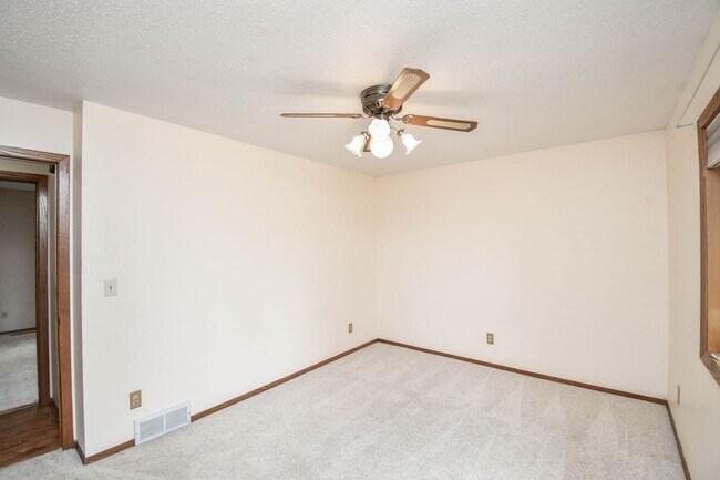 Building Photo - Spacious 4-Bedroom Acreage with Stunning Views Near Hartford — 1.5 Acres of Country Living!