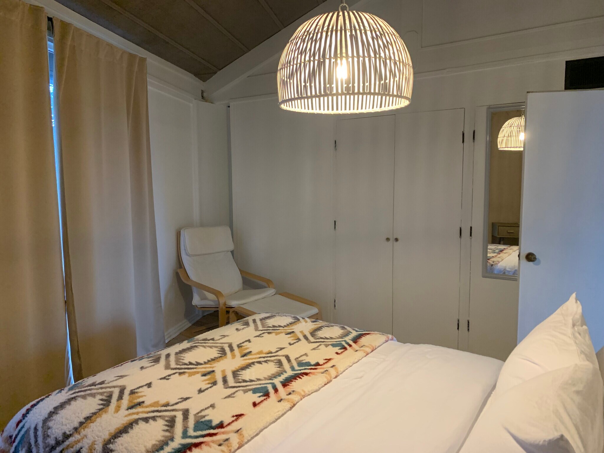 Primary bedroom with queen and attached bath - 149 Treetop Knl Dr