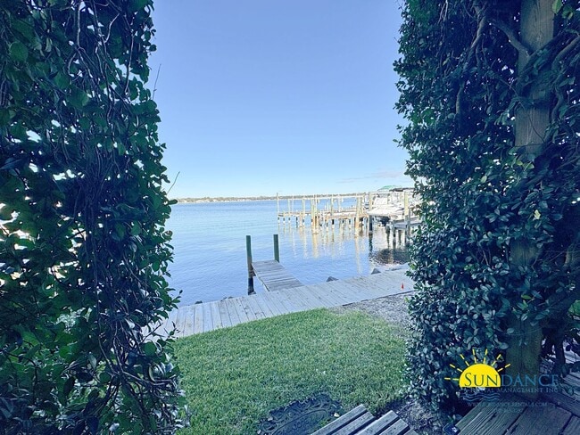 Building Photo - Waterfront Luxury Living on Garniers Bayou with Boat Slip/Lift Included!