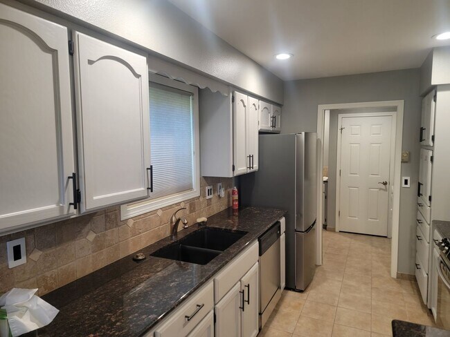 Building Photo - Beautifully Maintained Rancher In Sought-A...