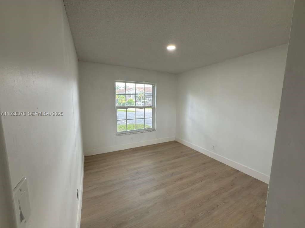 Building Photo - 9001 Jacaranda Ln