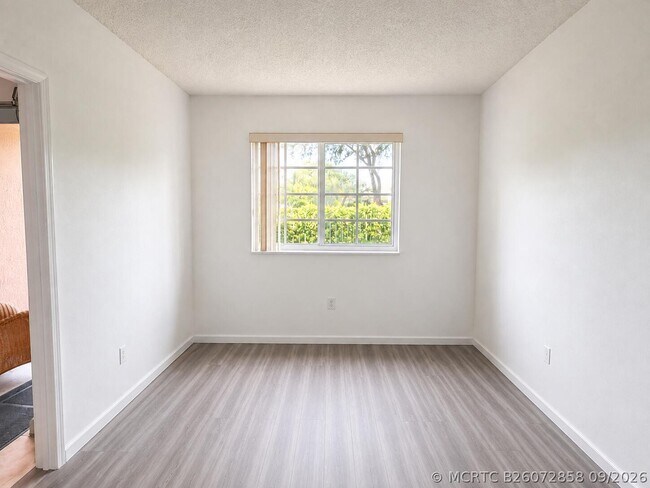 Building Photo - 3271 Sabal Palm Manor