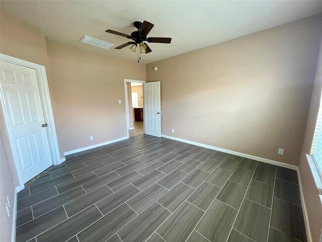 Building Photo - 10803 Woodwind Shadows Dr