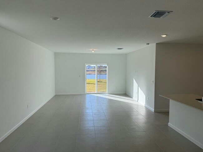 Building Photo - 5892 NW Sweetwood Dr