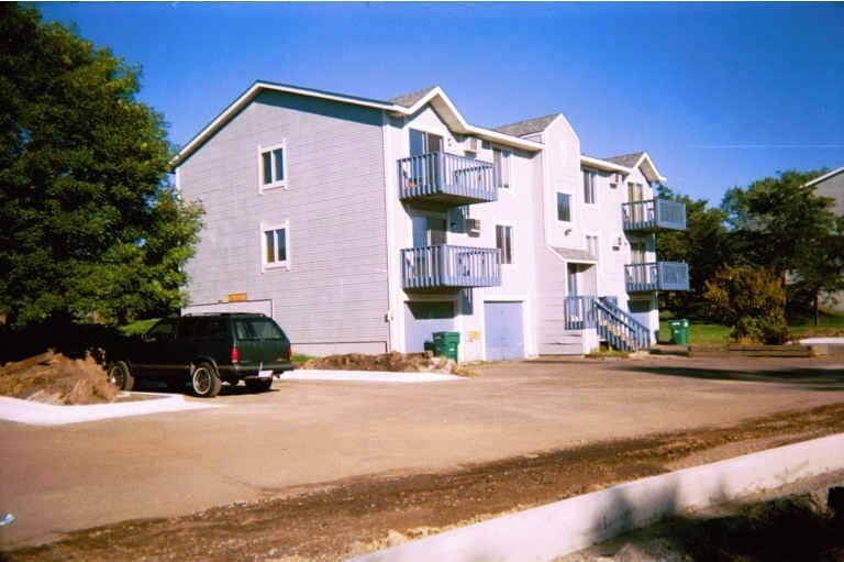 Top unit, left side, deck faces south - 230 Hallam Ave S
