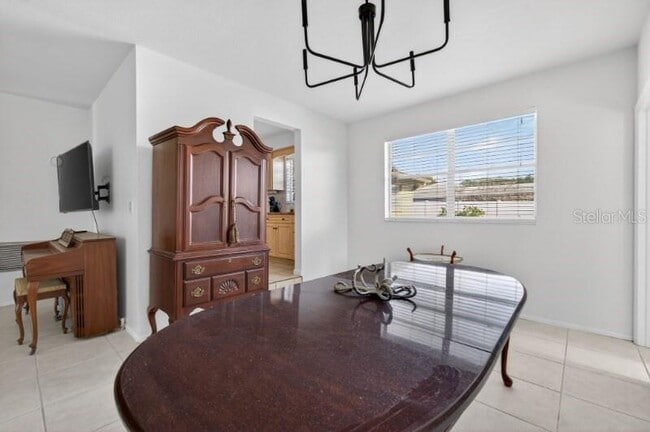 Building Photo - 8195 Coachlight Cir