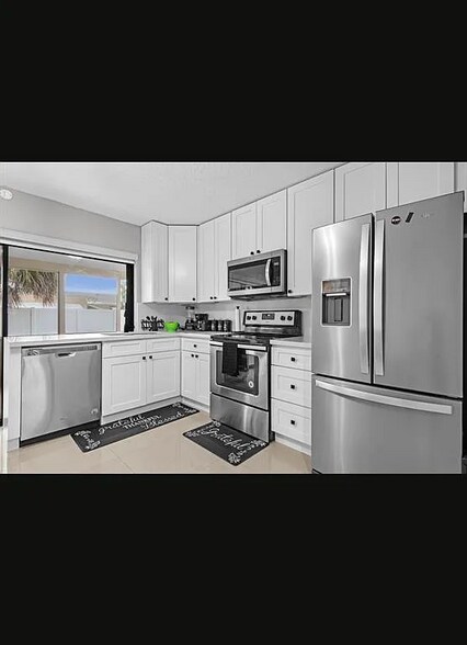 Building Photo - 5404 NW 25th Ave