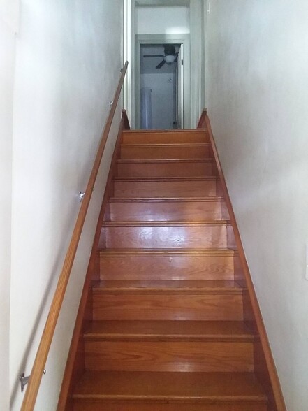 Stairs to second floor - 227 E Lamb St