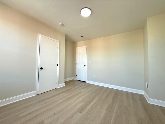 Building Photo - Modern 3BR Rowhome with Finished Lower Level & Rear Deck