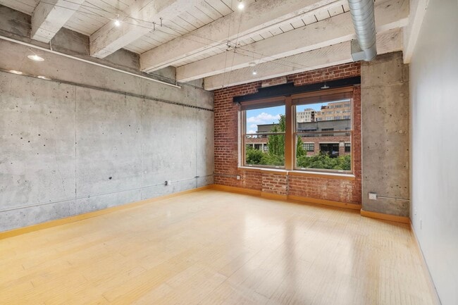 Building Photo - Historic Chown Pella Lofts - east facing studio w/parking/most utilities/rooftop deck