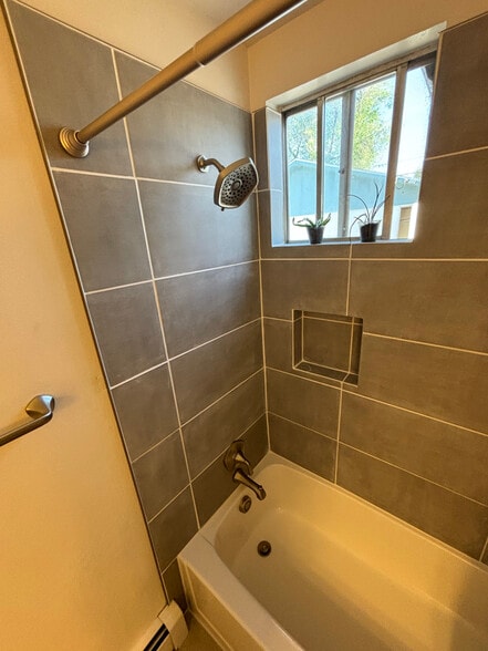 New shower fxitures. - 1718 White Ave