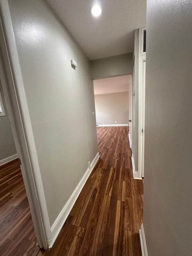 Building Photo - 4 bedrooms 1 Full bathroom. The house is very spacious living room, dining room and full kitchen ...