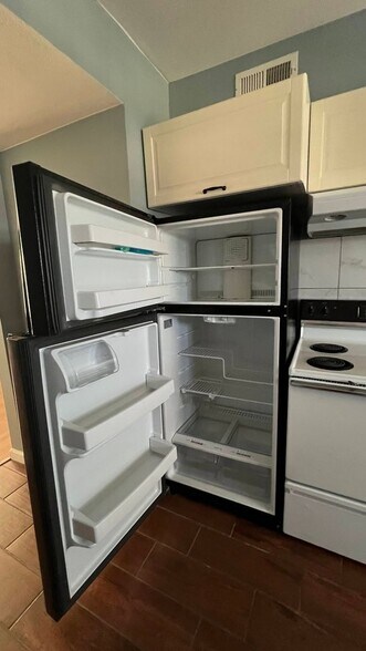 Building Photo - 9250 E Girard Ave