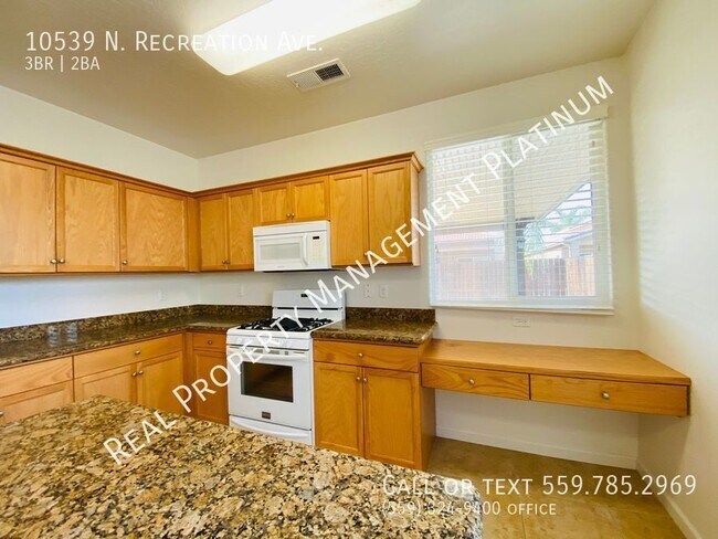 Building Photo - 10539 N Recreation Ave