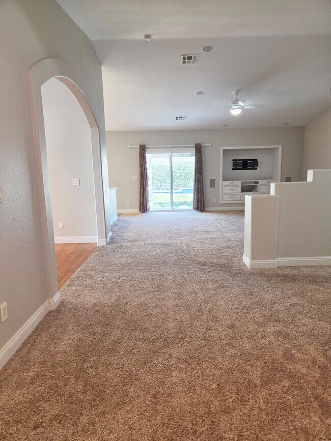 Building Photo - Gated Single-Story Home with Heated Pool, RV Parking & 3-Car Garage