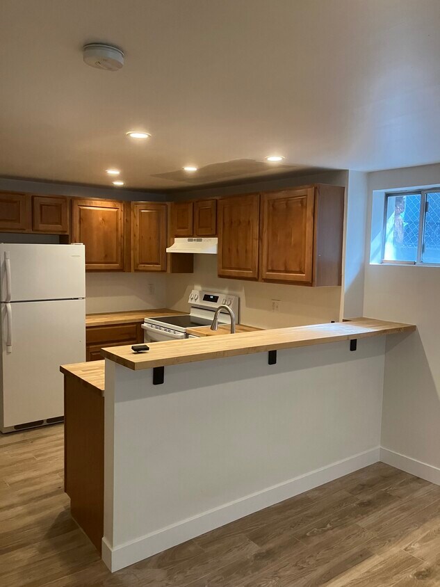 Open Area Kitchen Bar Area with Butcher Block Counter - 1109 1st Ave N