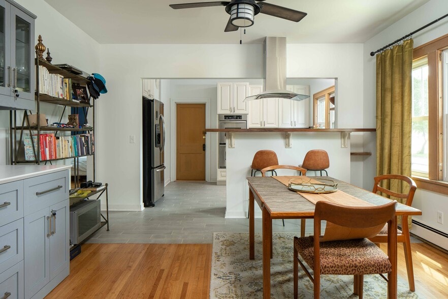 Dining room w kitchen bar - 2401 3rd st NE Apt 2