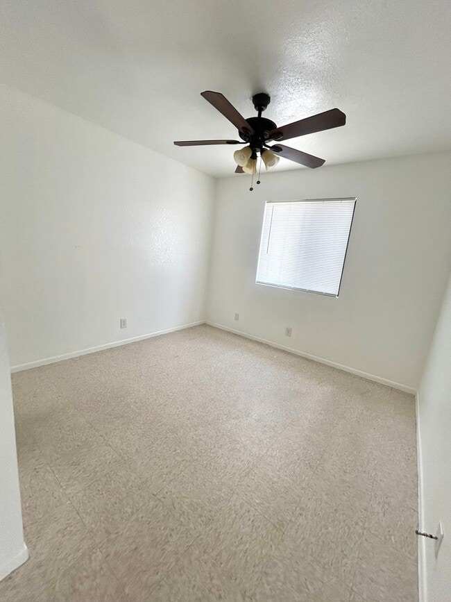 Building Photo - 6547-6549 49 Palms Ave