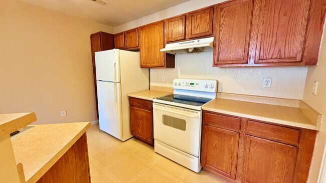 Building Photo - NEW CARPET NEW PAINT!! Clean and Bright 2BR 2BTH Condo Close To DIA. Gated Community in First Cre...