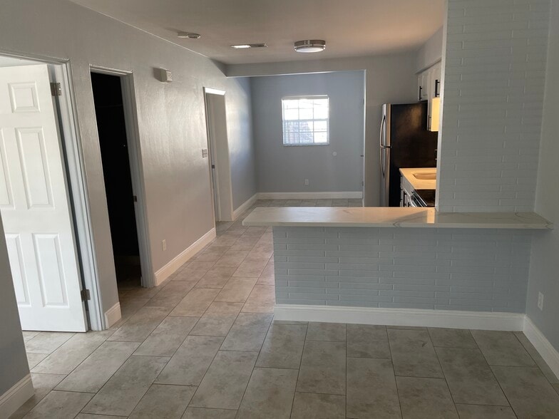 Kitchen area and in the back an area for office/dinette - 3815 1ST AVE N