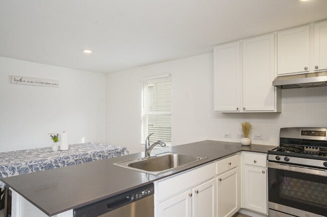 Building Photo - **First Month Rent Special**50% Off First Month Rent**Call Today! "Spacious 4-Bed, 3-Bath Gem in ...