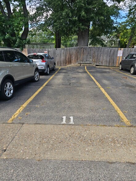 space #11 for 2 cars visible right from your living room window. - 8582 Chesapeake Blvd
