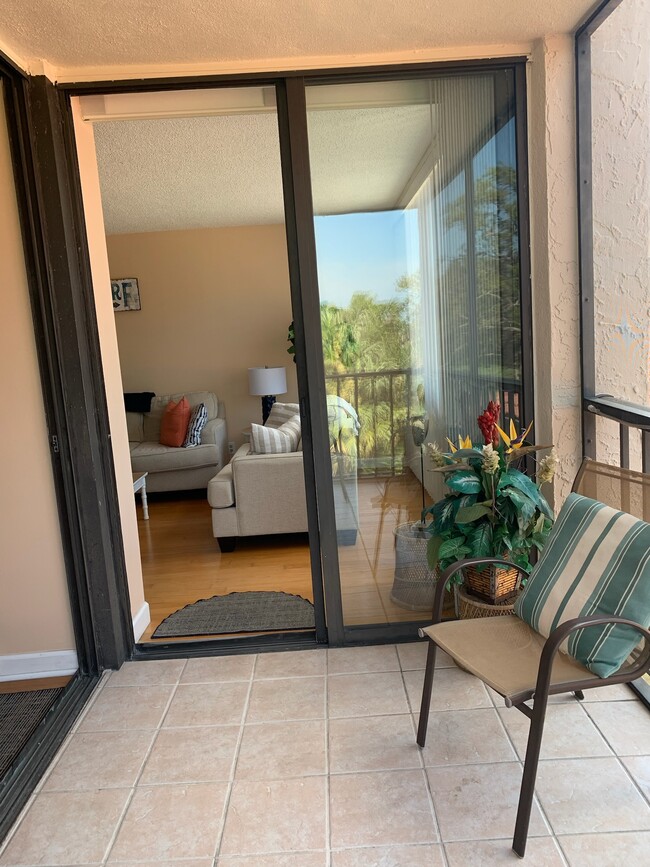 Double slider off of great room to lanai - 6219 Palma Del Mar Blvd S