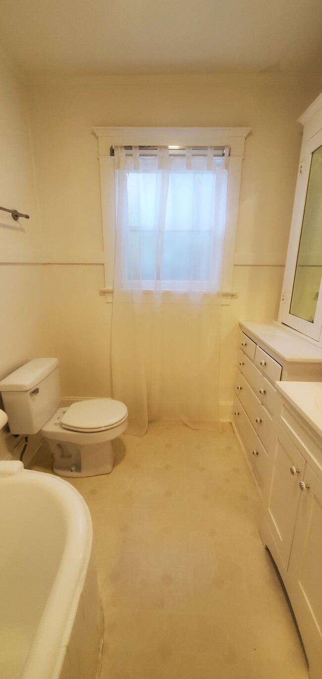 Bathroom with vanity built-ins for lots of storage - 1229 N Orange Grove Ave