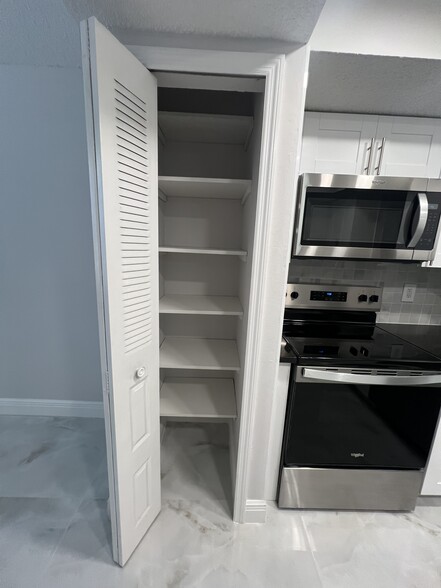 Pantry closet with new shelving - 1060 NW 80th Ave