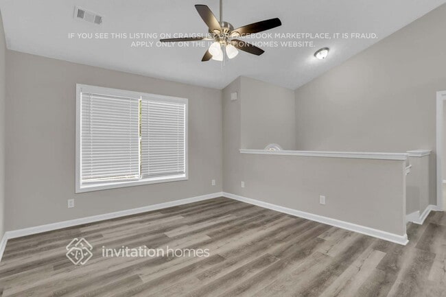 Building Photo - 6017 Happy Trails Ct