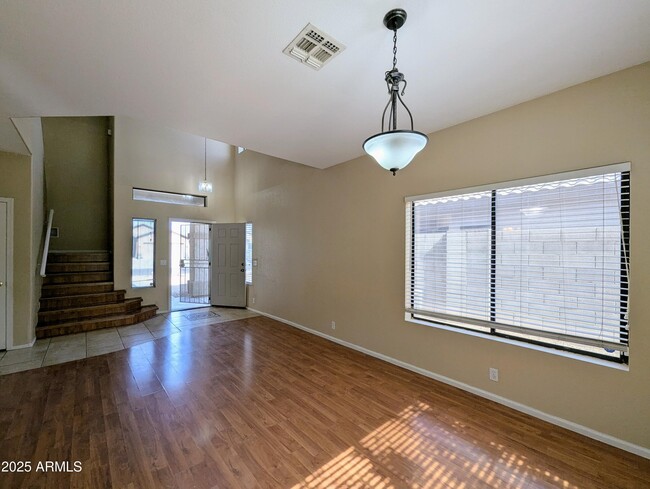 Building Photo - 8861 W Paradise Dr