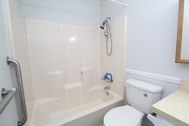 Building Photo - Charming 3-Bedroom Brick Home on Half an A...