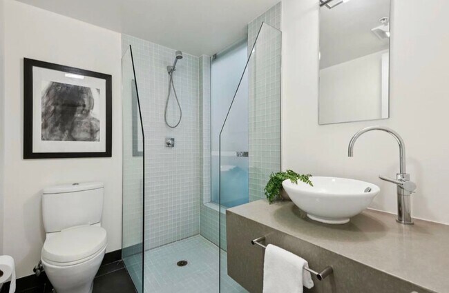 Building Photo - One-of-a-Kind Sophisticated Top-Floor Cond...