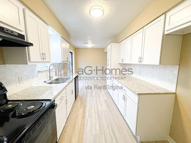 Building Photo - 8412 S Douglas Ave