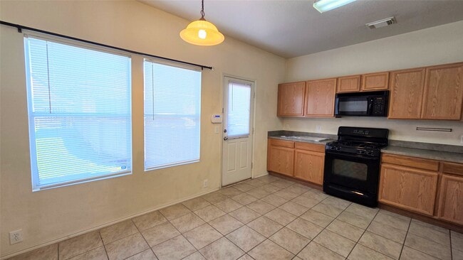 Building Photo - 9702 Coyote Creek Dr