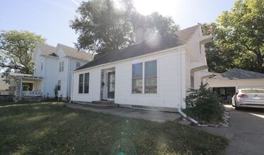 Building Photo - Spacious 5 Bedroom Home Perfectly Located ...