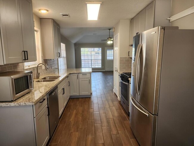 Building Photo - 8307 Holmwood Dr