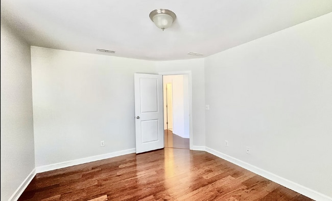 Building Photo - "Charming 3-Bed End-Unit Townhome Retreat ...