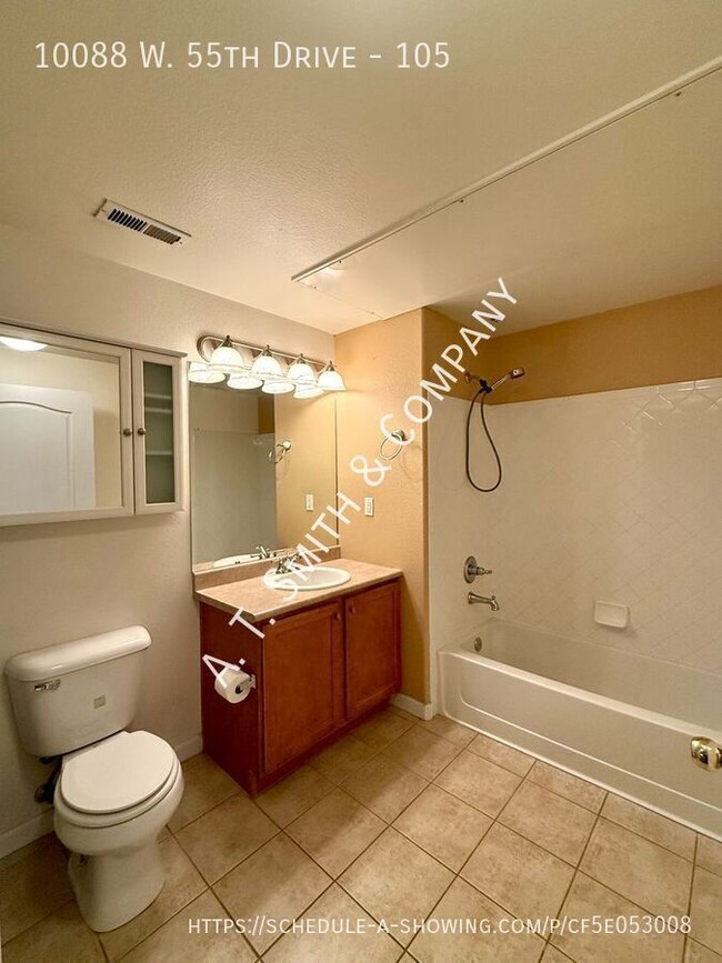 Building Photo - 10088 W 55th Dr