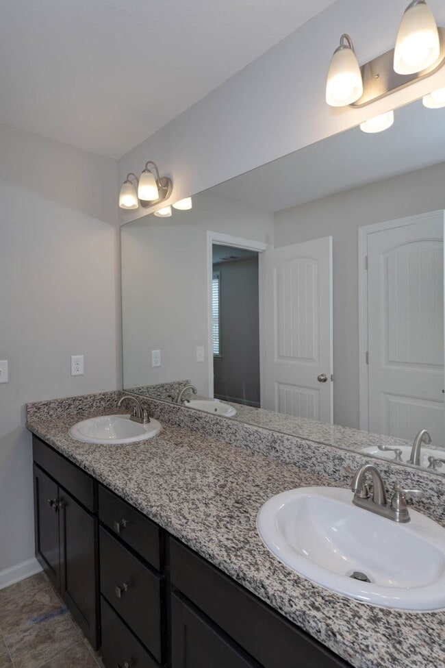 Building Photo - 4BR/3.5BA · 2,809 SF · Owner's Suite on Main · Fenced Yard · Midland, GA — $2,800/mo