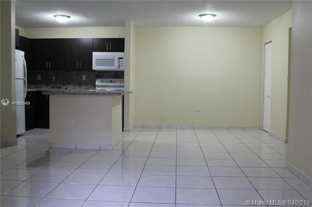 Building Photo - 4680 NW 102nd Ave  104-20