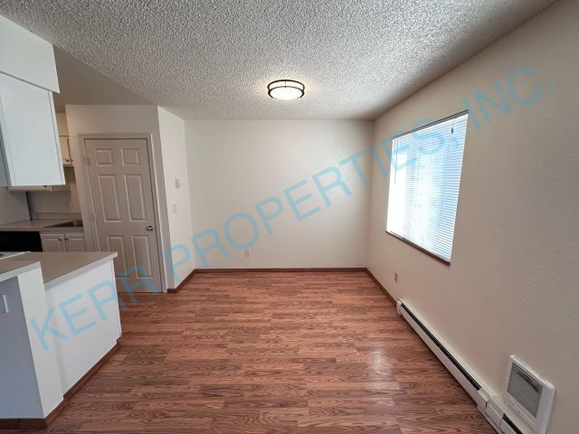 Building Photo - Charming 2-Bed Condo with Modern Comforts ...