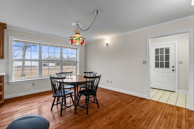 Building Photo - Country Living within Minutes of City Life