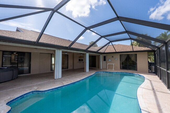 Building Photo - 3 BEDROOM • 2 BATHROOM • PRIVATE POOL • WATERFRONT • BOAT LIFT • ZERO DEPOSIT MOVE-IN AVAILABLE