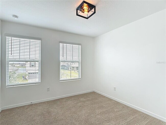 Building Photo - 2512 Blowing Breeze Ave