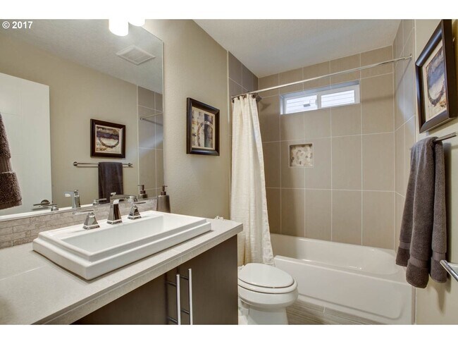 Building Photo - Charming 3BR Home with Fireplace, Bright Open Living Spaces & Loft