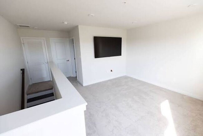 Building Photo - Available Now! Discover urban living at its finest in this 4-level gem!