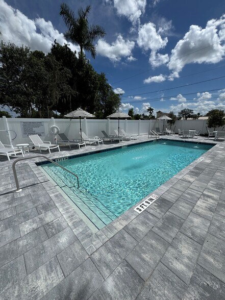 Relax at the pool! - The Bella Downtown
