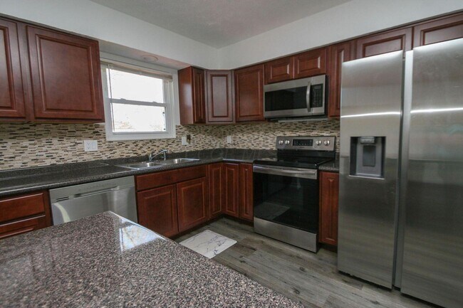 Building Photo - 1080 Arapaho Ave