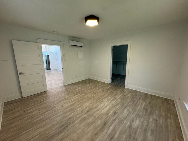 Building Photo - Stylish & Modern Living in the Heart of Tr...